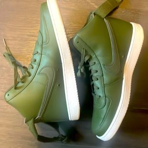 High top army green Nike sneakers